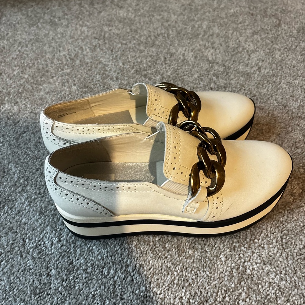Dolce Vita White Flats with Gold Chain Accent